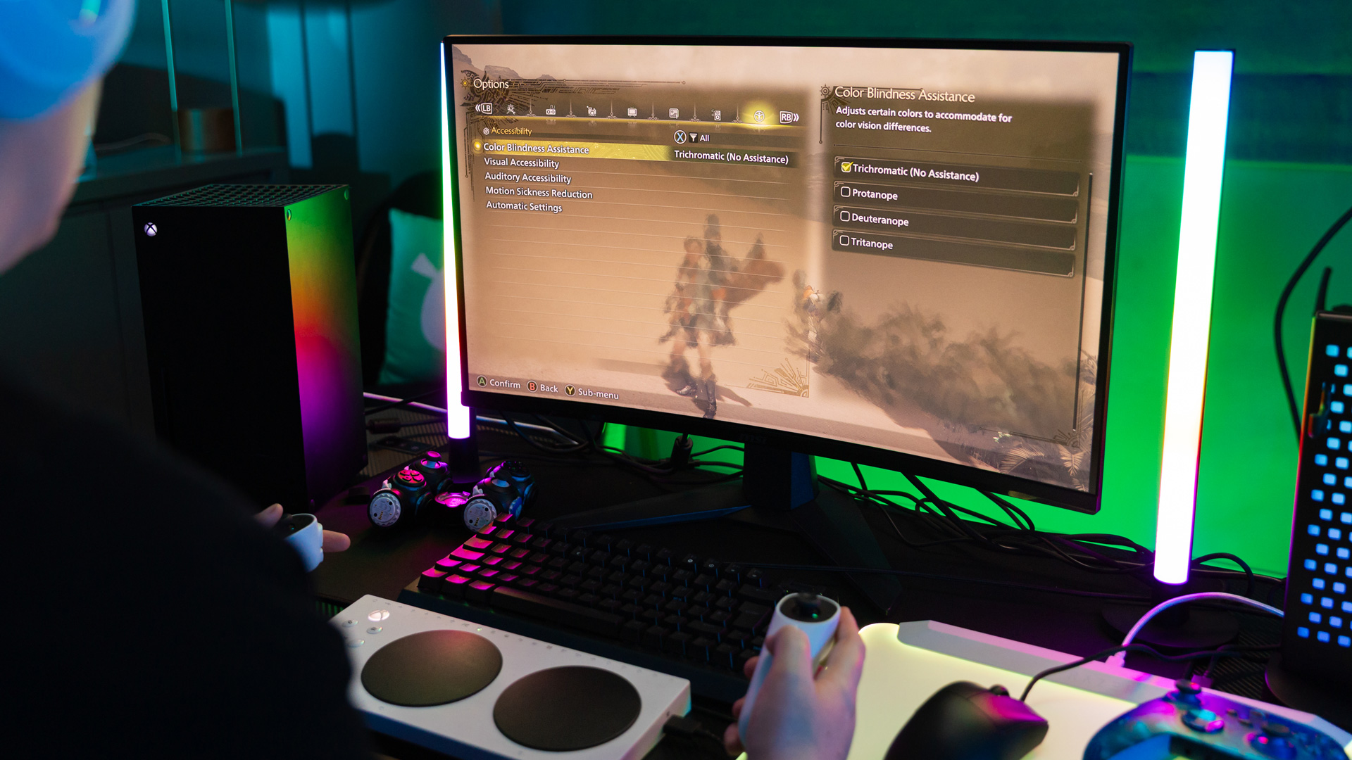 An example of the Accessibility options in a video game, displayed on a monitor on a gaming desk with accessible controllers