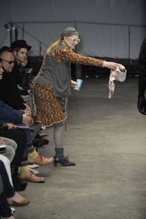 As if in proof of her son's impressive sartorial credentials, Vivienne Westwood takes to the runway mid show