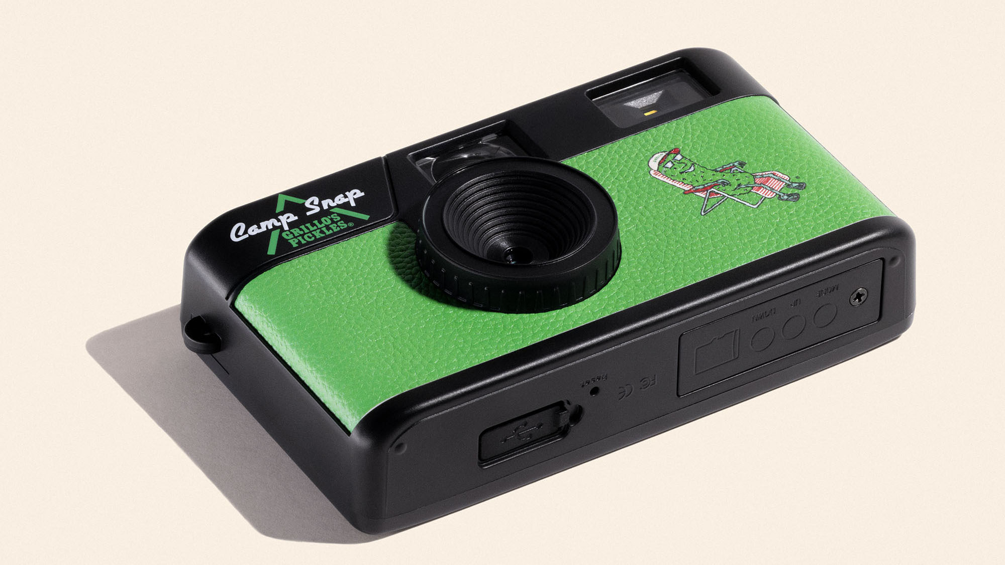 The Camp Snap x Grillo's compact camera is a green pickle-themed camera