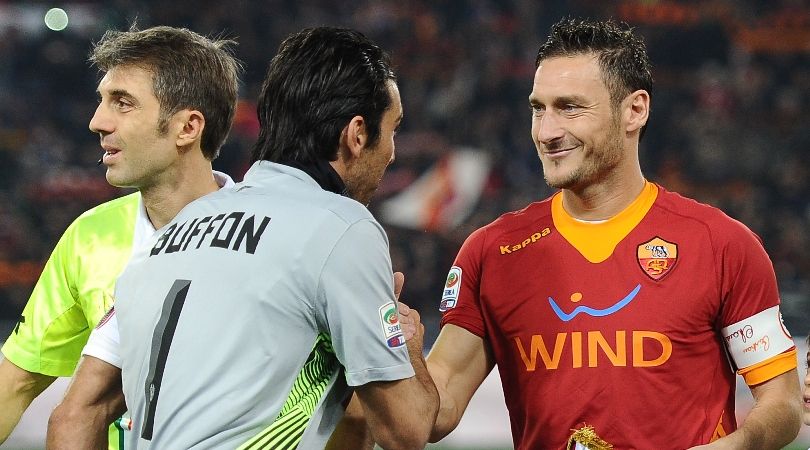 Juventus goalkeeper Gianluigi Buffon greets Roma forward Francesco Totti ahead of a Serie A match at the Stadio Olimpico in Rome in December 2011.