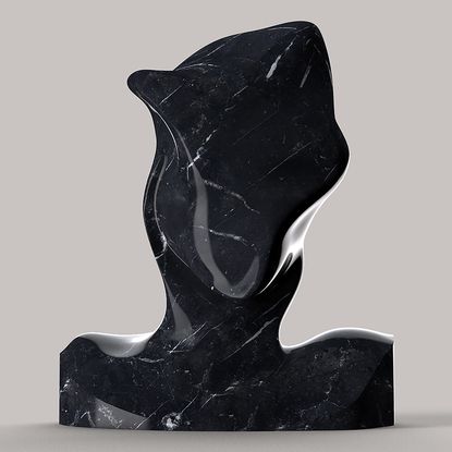 Image of Futurismo Nero Maquina. A large smooth black marble sculpture.