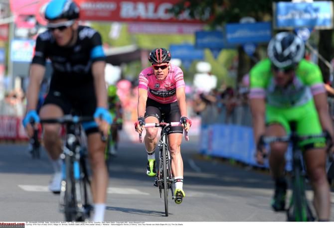 Cadel Evans crosses the line