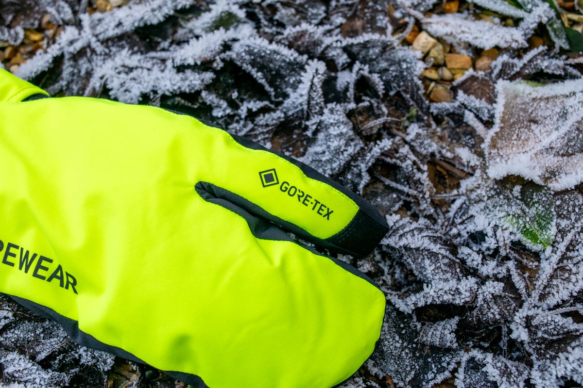 A Gore Wear Trigger glove on some frosted leaves