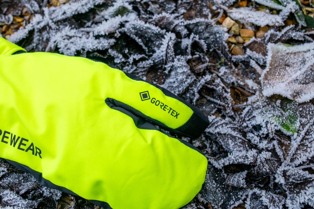 A Gore Wear Trigger glove on some frosted leaves