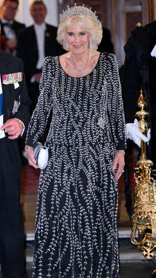 Queen Camilla arrives at a reception and dinner in honour of the Coronation