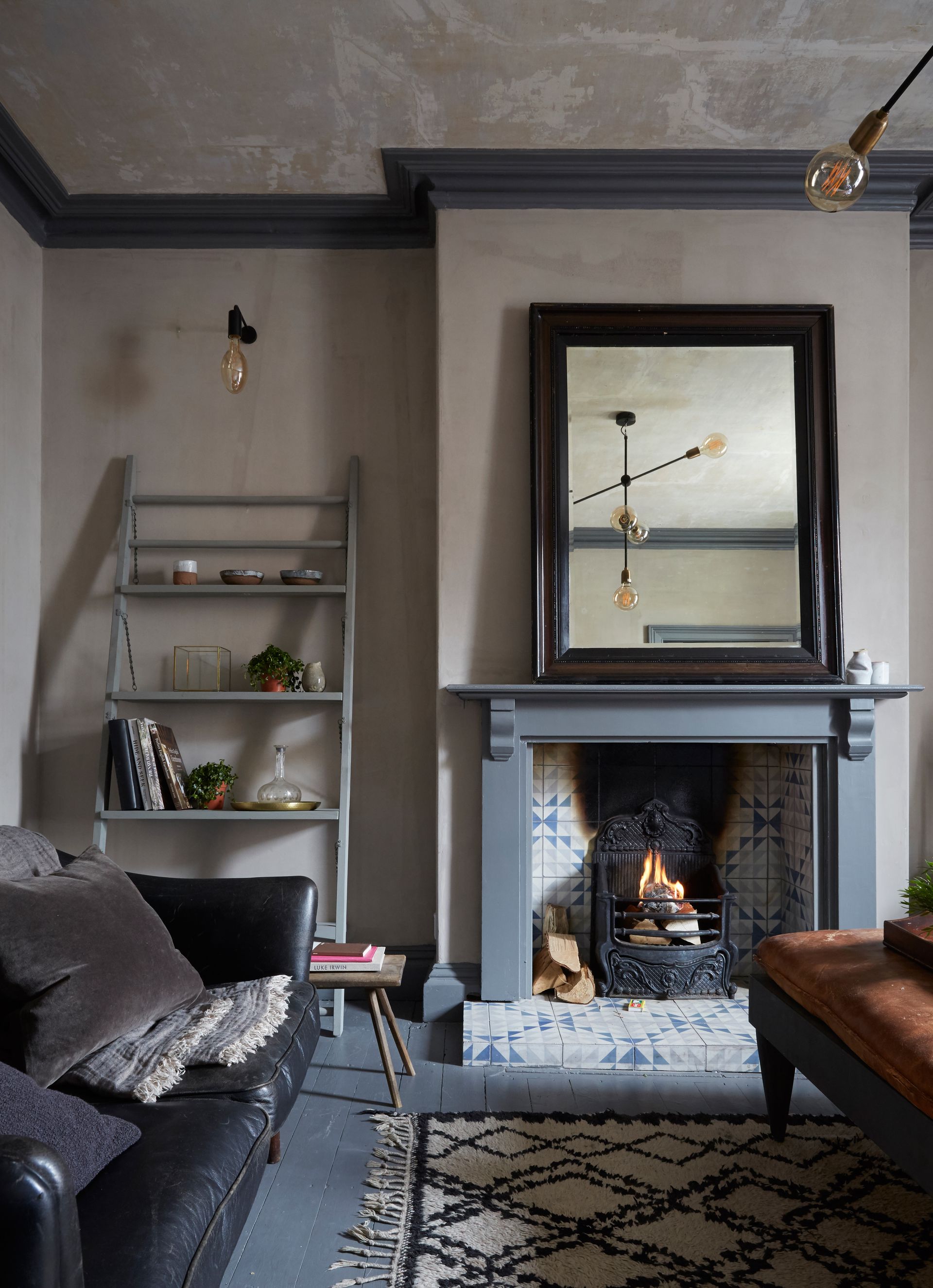 Tiled fireplace in rustic living room