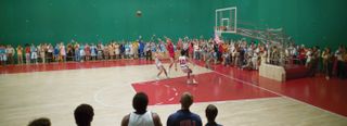 A basketball court shot against a greenscreen