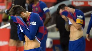 Gerard Pique and Lionel Messi at Barcelona.