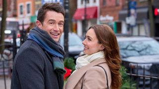 Robert Buckley and Amy Groening in Hallmark's "Twas the Date Before Christmas