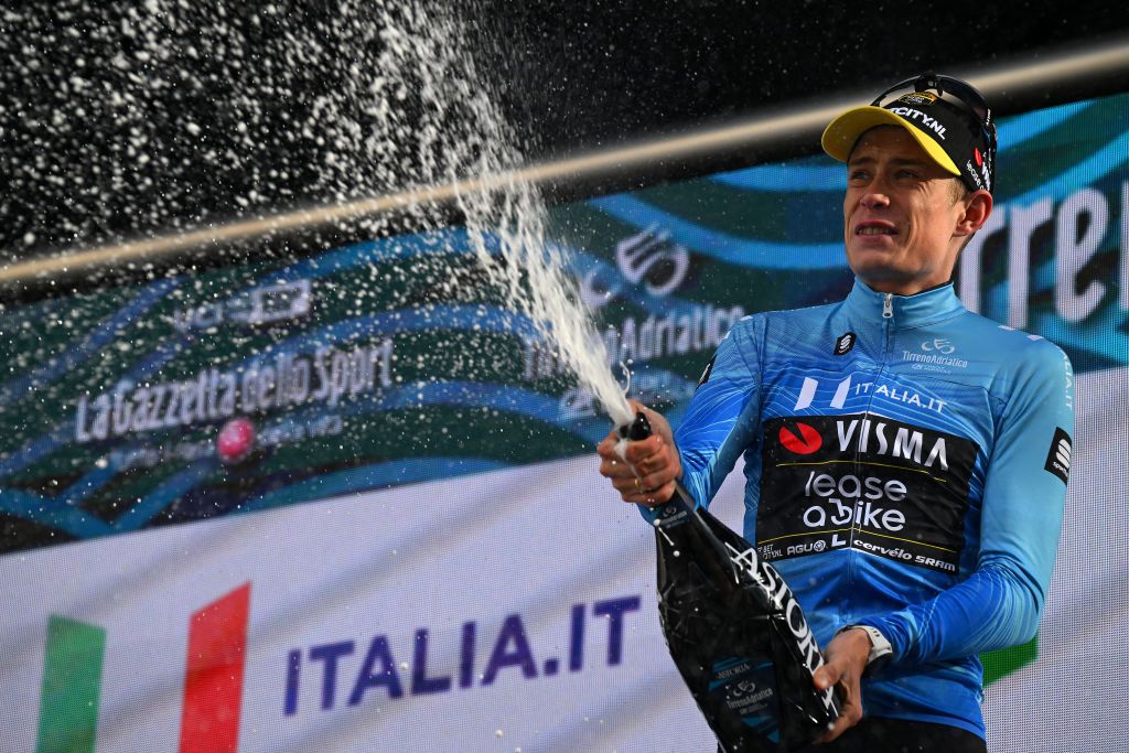 VALLE CASTELLANA ITALY MARCH 08 Jonas Vingegaard Hansen of Denmark and Team VismaLease A Bike celebrates at podium as Blue Leader Jersey winner during the 59th TirrenoAdriatico 2024 Stage 5 a 144km stage from Torricella Sicura to Valle Castellana 615m UCIWT on March 08 2024 in Valle Castellana Italy Photo by Tim de WaeleGetty Images