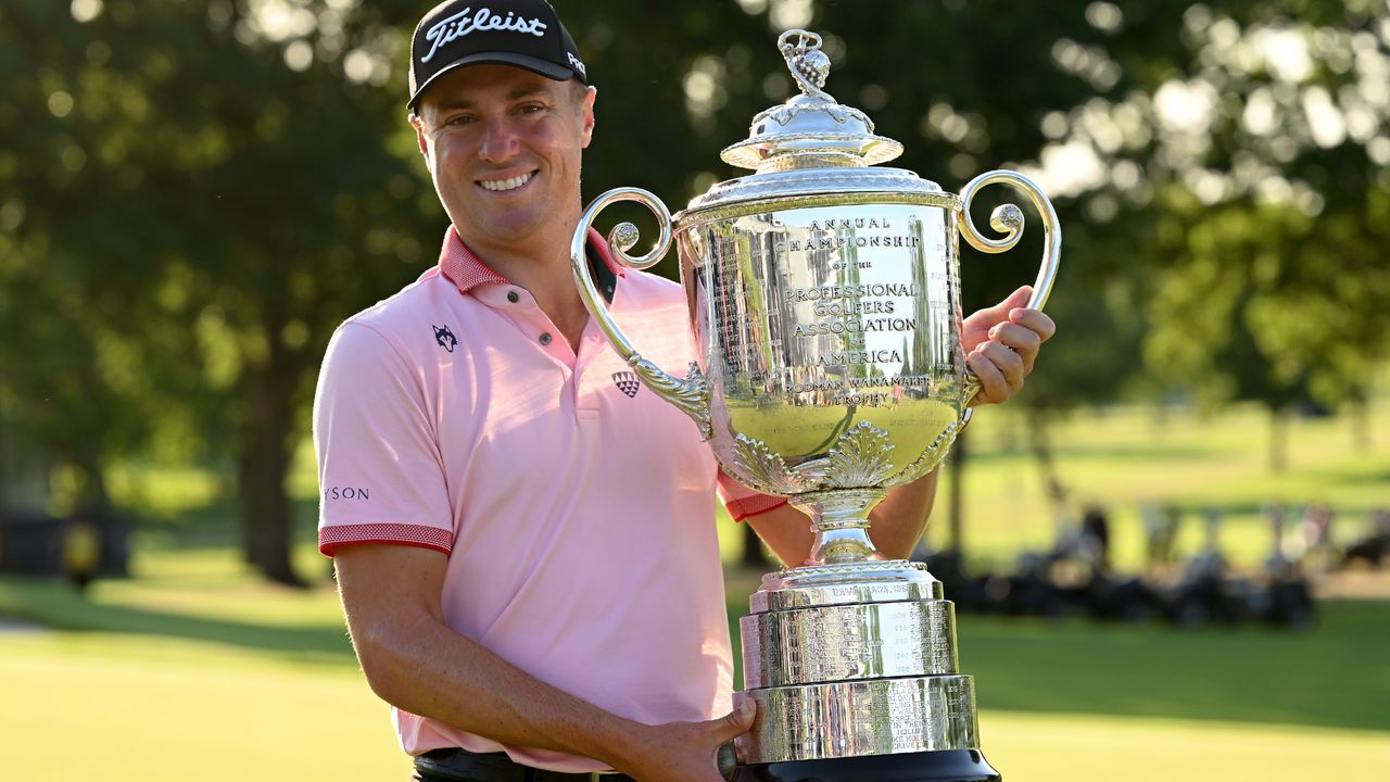 Justin Thomas poses with the Wanamaker Trophy after winning the 2022 PGA Championship