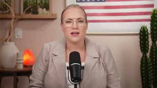 Meghan McCain talking into a mic on Critizen McCain.