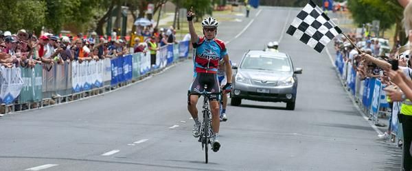 South Australian Rohan Dennis takes out the men's under 23 road race title ahead of Victorian Eric Sheppard (partly obscured)