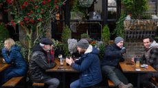 Drinkers outside a pub in Windsor