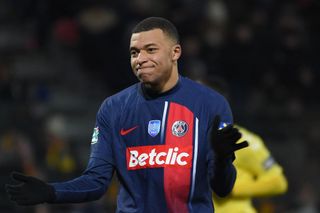 Paris Saint-Germain's French forward #07 Kylian Mbappe reacts during the French Cup round of 32 football match between US Orleans Loiret Football and Paris Saint-Germain (PSG) at the Stade de la Source, in Orleans, central France, on January 20, 2024. (Photo by Guillaume SOUVANT / AFP) (Photo by GUILLAUME SOUVANT/AFP via Getty Images)