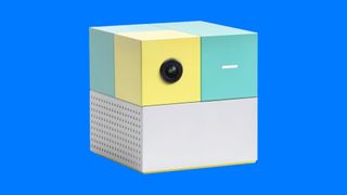 Nex Playground deal; a small square box on a wooden table