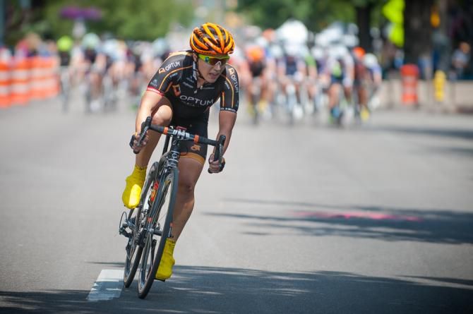 An Optum rider off teh front of the field attemting to close a gap.