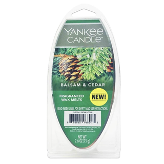 a stock photo of the green balsam and cedar wax melt by Yankee Candle in its original packaging