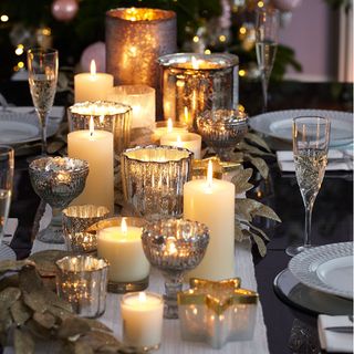 Christmas candle ideas with silver glass candles on table