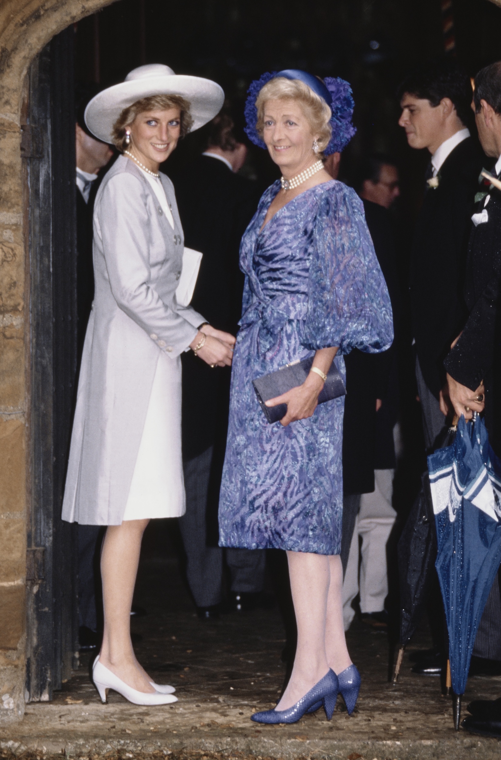 Princess Diana standing outside a church with Frances Shand Kydd
