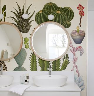 Attic ensuite bathroom with bespoke wallpaper design of botanical prints