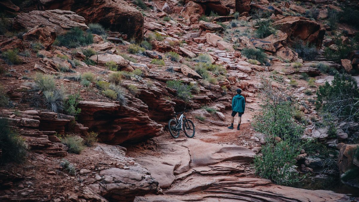 Braydon Bringhurst climbing the iconic Whole Enchilada