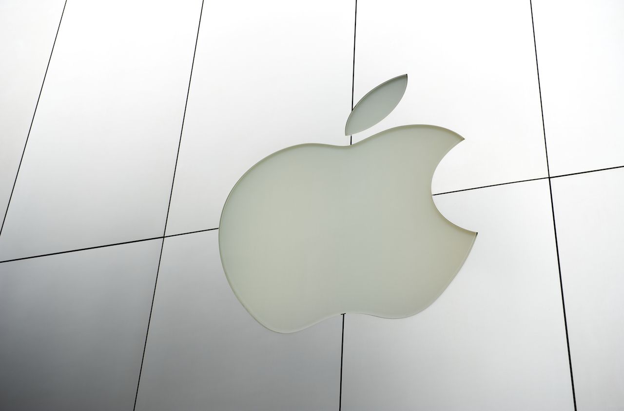 San Francisco, USA - August 4, 2011: Apple Computers logo sits in brushed metal facade of a store in Union Square. Apple&amp;#039;s control over branding and the consumer experience is legendary, and 