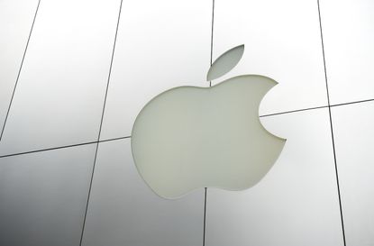 San Francisco, USA - August 4, 2011: Apple Computers logo sits in brushed metal facade of a store in Union Square. Apple's control over branding and the consumer experience is legendary, and 