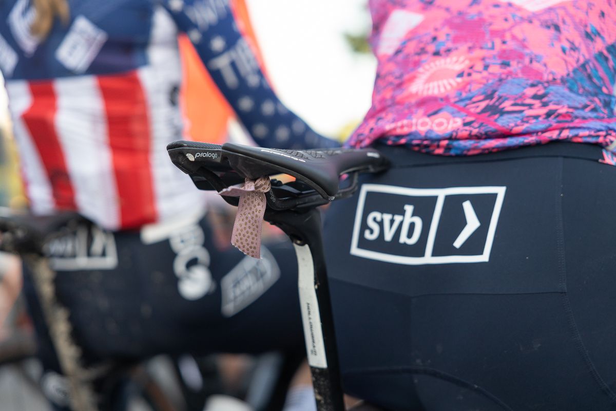 Emily Newsom teammate Lauren Stephens (EF Education Tibco SVB) and were handing out ribbons for people to tie to their saddles in honor of Mo.