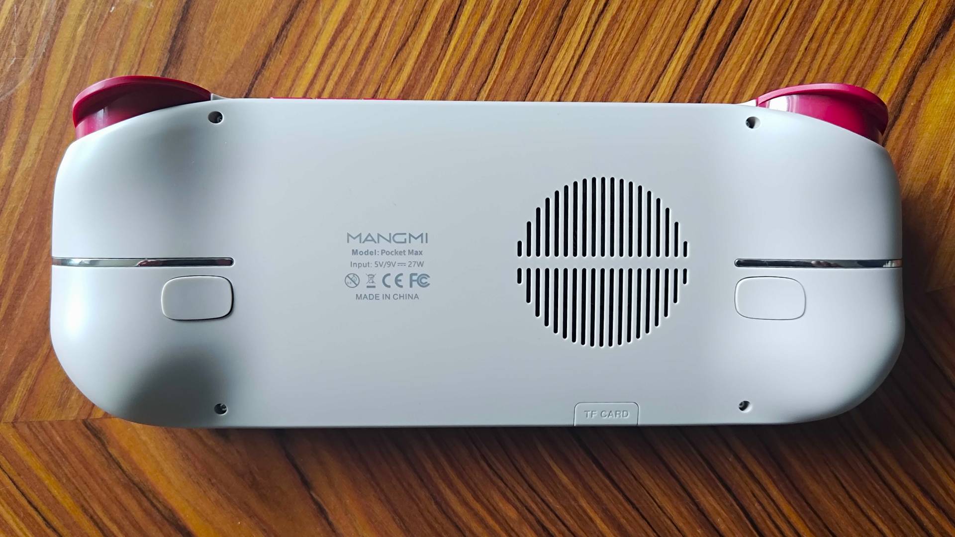 Back view of Mangmi Pocket Max on woodgrain table.