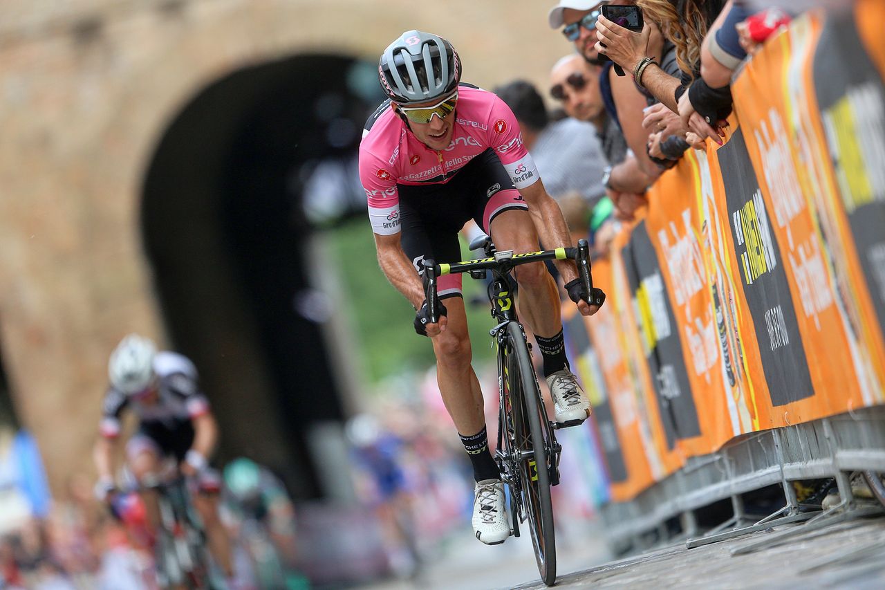 Simon Yates attacking with Tom Dumoulin looming behind him