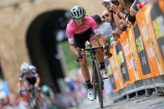 Simon Yates attacking with Tom Dumoulin looming behind him