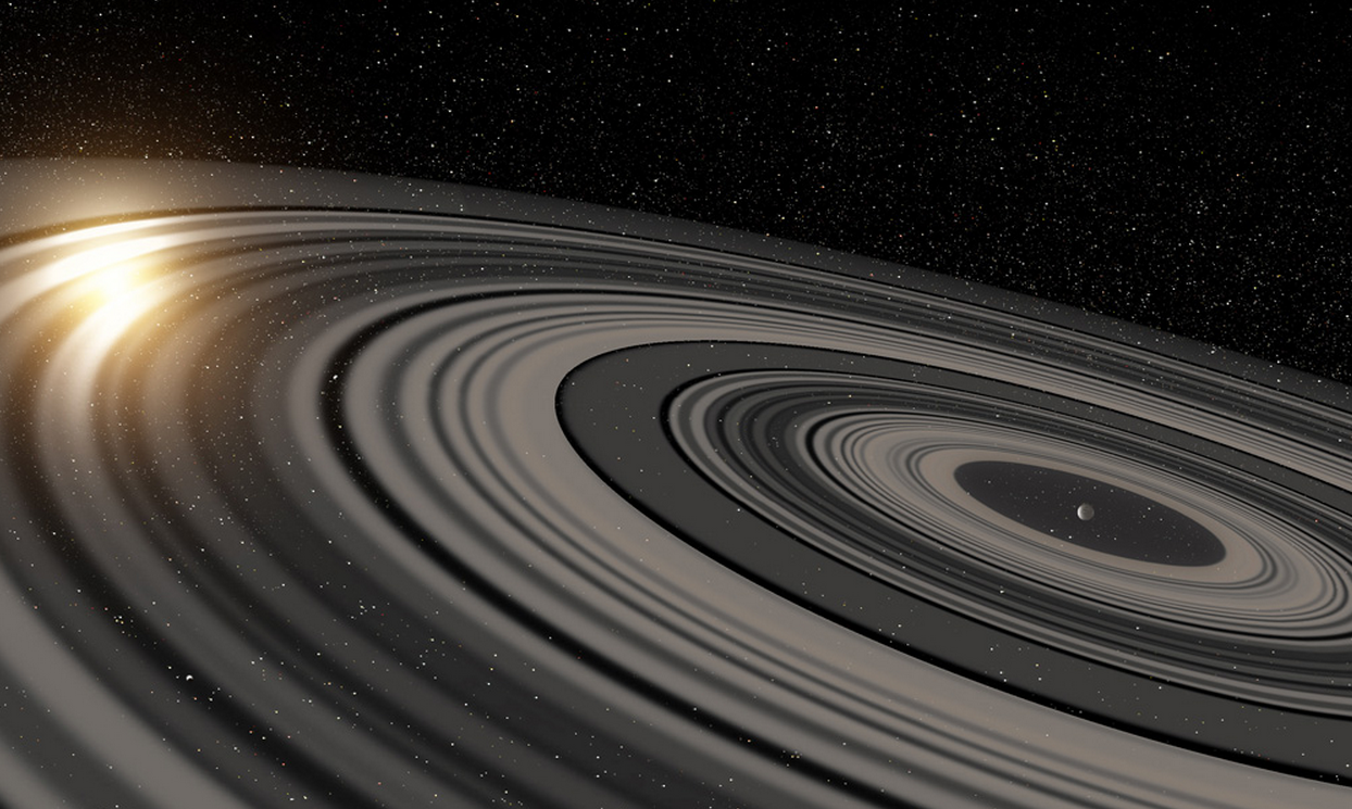 An artist&#039;s conception of the extrasolar ring system circling the alien planet J1407b.