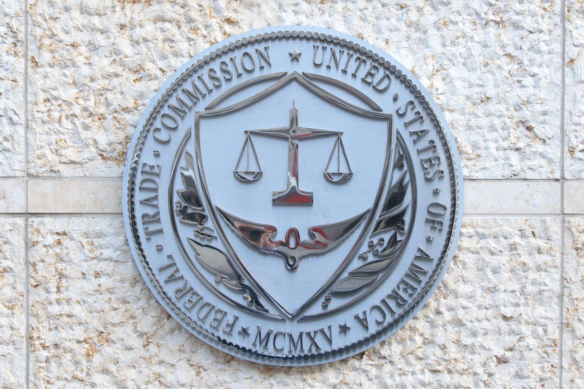 The FTC crest on a building