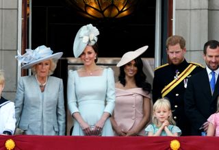 Camilla, Duchess of Cornwall. Catherine, Duchess of Cambridge, Meghan, Duchess of Sussex, Prince Harry, Duke of Sussex, Isla Phillips and Peter Phillips on the balcony of Buckingham Palace during Trooping the Colour on June 09, 2018 in London