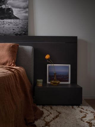 A dark toned bedroom