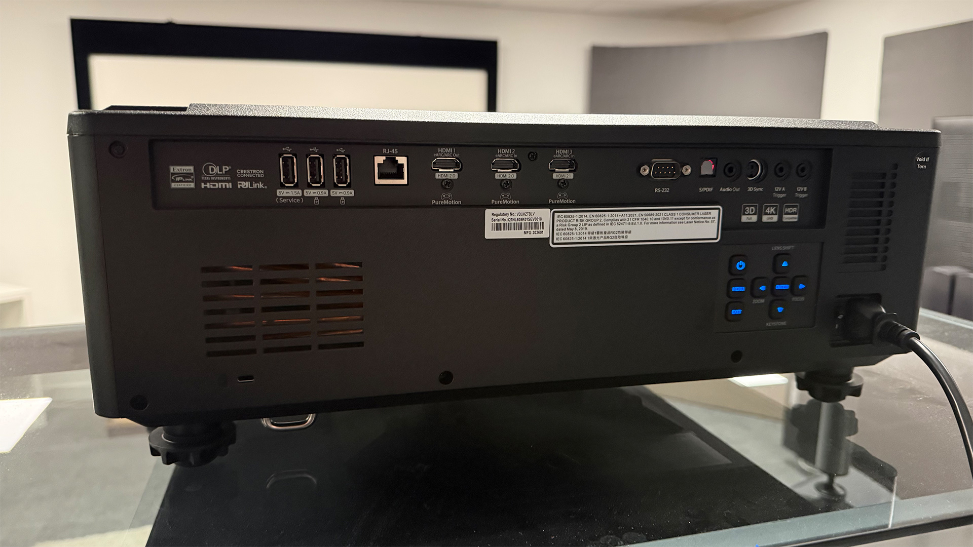 Optoma UHZ78LV home cinema projector, rear of unit showing connections and controls