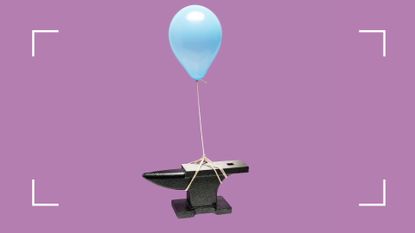 Anvil being held up by a blue balloon on a string, symbolic of stress vs burnout