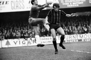 Ted MacDougall (right) of Bournemouth competes for the ball with Southend United's goalkeeper in an FA Cup clash in December 1971.