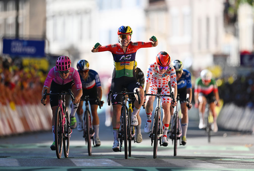 Kimberley Le Court Pienaar of Mauritius and Team AG Insurance - Soudal celebrates at finish line as stage winner ahead of (L-R) Cedrine Kerbaol of France and Team EF Education - Oatly and Puck Pieterse of Netherlands and Team Fenix - Premier Tech - Polka Dot Mountain Jersey during the 5th Tour de France Femmes 2026