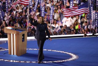 US Vice President and 2024 Democratic presidential candidate Kamala Harris waves as she leaves the stage on the fourth and last day of the Democratic National Convention (DNC) at the United Center in Chicago, Illinois, on August 22, 2024. Vice President Kamala Harris formally accepted the party's nomination for president today at the DNC which ran from August 19-22 in Chicago.