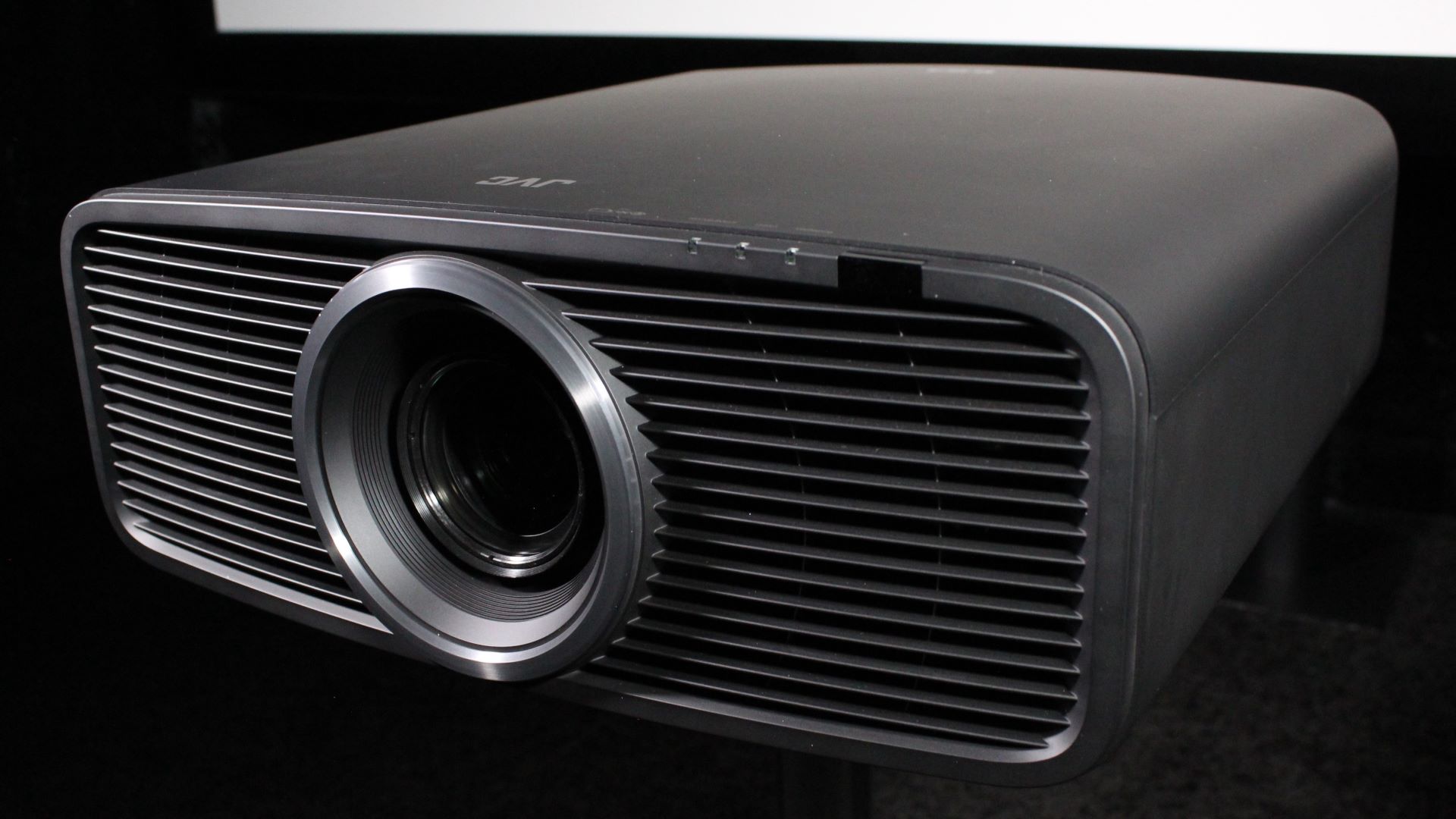JVC DLA-NZ700 on table