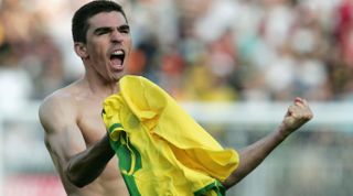 NUREMBERG, GERMANY - JUNE 25: Lucio of Brazil celebrates victory in the Semi Final match between Germany and Brazil in the FIFA Confederations Cup 2005 at the Franken Stadium on June 25, 2005 in Nuremberg, Germany. (Photo by Martin Rose/Bongarts/Getty Images)