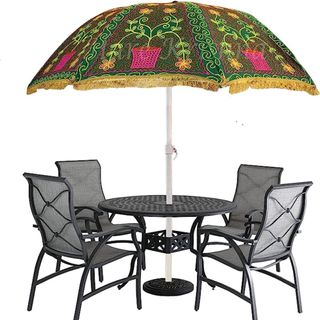 outdoor umbrella for table with green pink yellow and white design 
