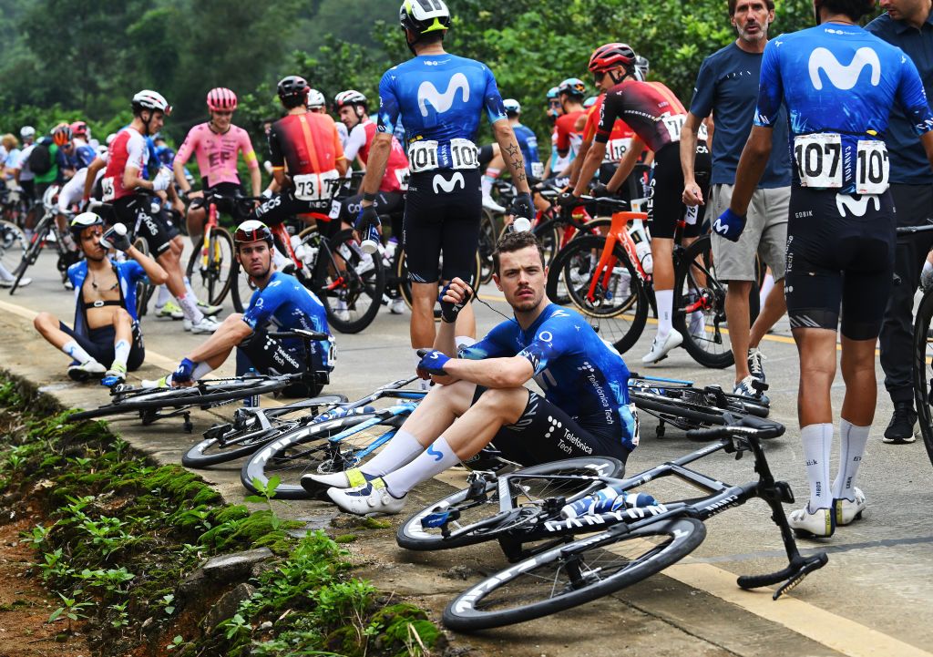 BAMA CHINA OCTOBER 17 Remi Cavagna of France and Movistar Team and the peloton stopped due to a multiple fall during the 5th GreeTour Of Guangxi 2024 Stage 3 a 214km stage from Jingxi to Bama UCIWT on October 17 2024 in Bama China Photo by Dario BelingheriGetty Images