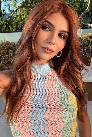 Olivia Jade wearing long, loose waves with face-framing strands