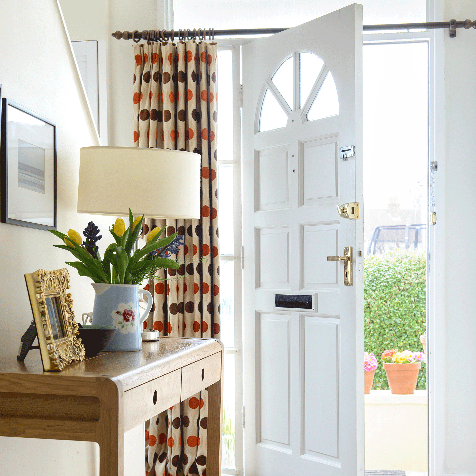 White door with wooden side console 