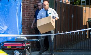 Police search a house in Chester believed to be the home of Lucy Letby in July 2018