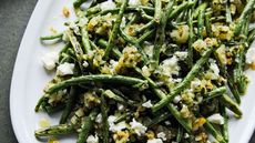 Plate of green beans with feta and lemon dressing