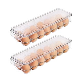 Two clear rectangular fridge boxes with eggs in